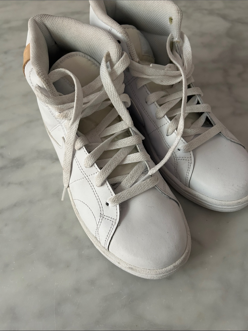 Nike White High Top Sneakers with White logo